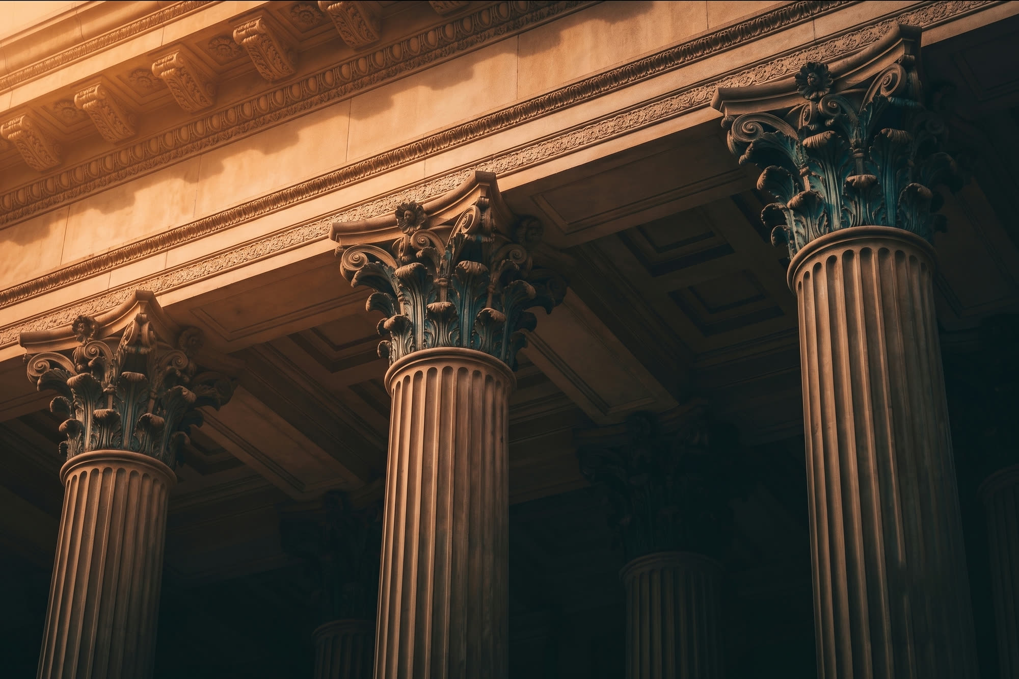 Sunlit classical courthouse columns